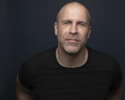 Adam G. Simon